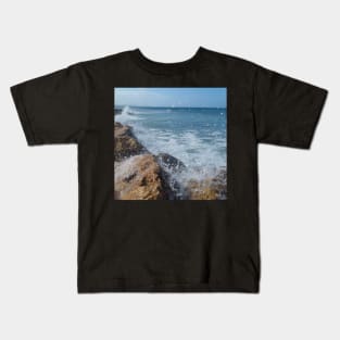 Rock beach, On the rocks, ocean waves surfing the rocks of a splashing dashing restless Caribbean Sea Kids T-Shirt